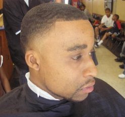 A black guy with the lowest fade haircut