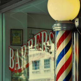old school barber store and barber pole