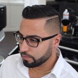 Shaved edges damp look hairstyle for men