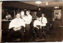 vintage barber shop males getting haircuts